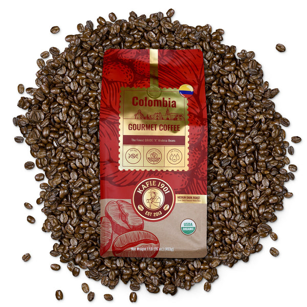 Kafie 1901 Colombia Coffee 1 lb whole bean bag on a pile of roasted coffee beans